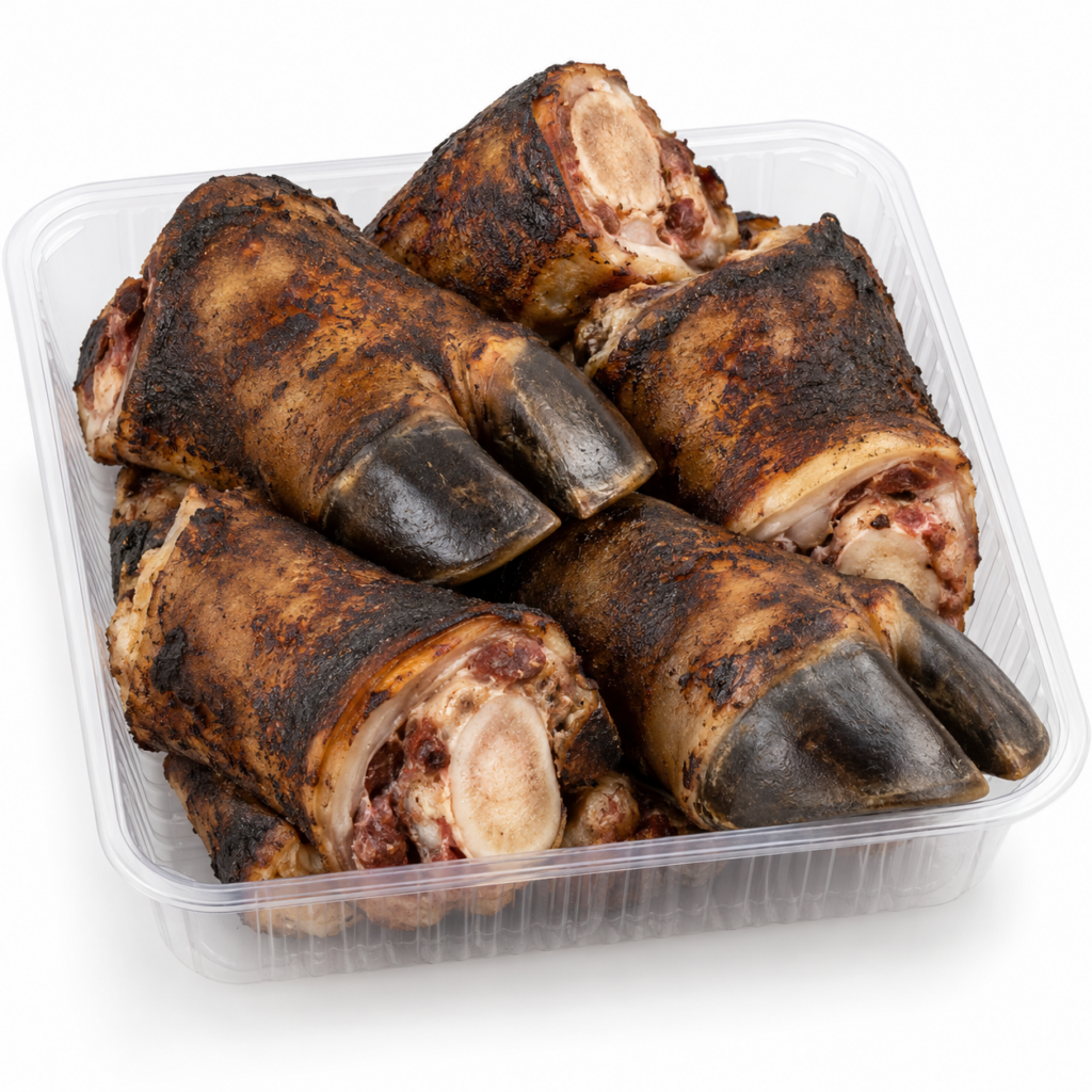 Burnt beef feet in plastic tray